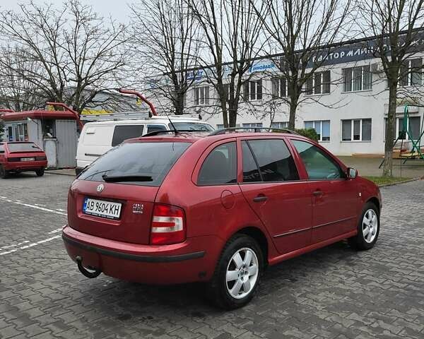 Красный Шкода Фабия, объемом двигателя 1.39 л и пробегом 212 тыс. км за 3800 $, фото 4 на Automoto.ua
