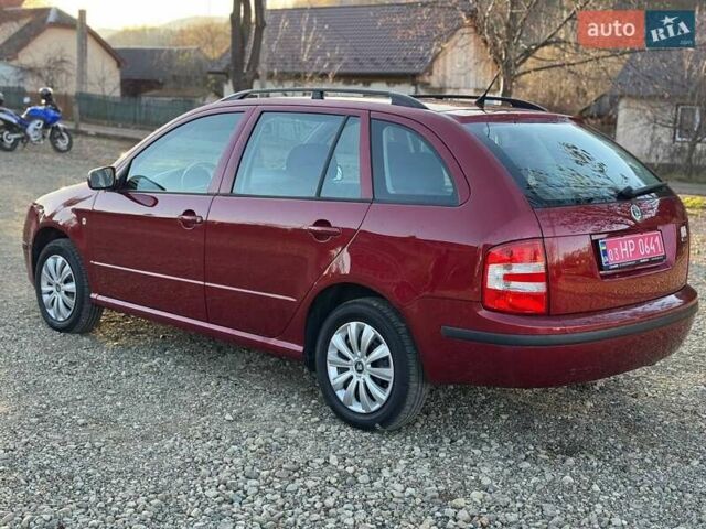 Красный Шкода Фабия, объемом двигателя 1.39 л и пробегом 201 тыс. км за 4199 $, фото 9 на Automoto.ua