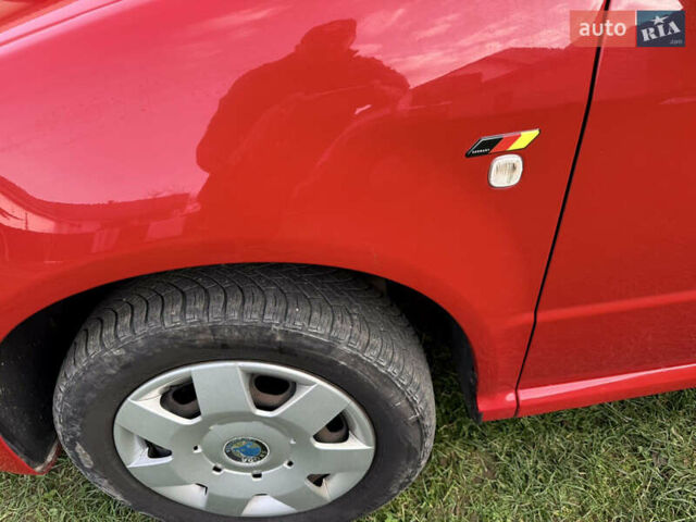 Красный Шкода Фабия, объемом двигателя 1.39 л и пробегом 209 тыс. км за 3990 $, фото 19 на Automoto.ua