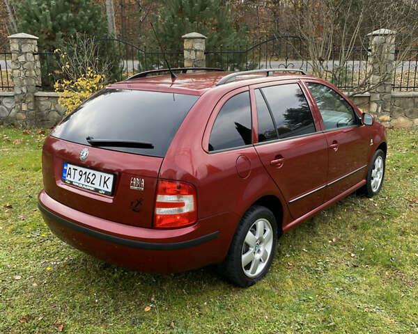 Красный Шкода Фабия, объемом двигателя 1.39 л и пробегом 194 тыс. км за 4490 $, фото 10 на Automoto.ua
