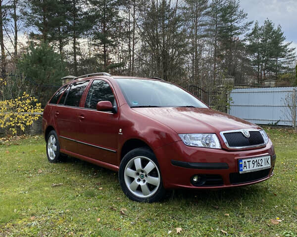 Красный Шкода Фабия, объемом двигателя 1.39 л и пробегом 194 тыс. км за 4490 $, фото 4 на Automoto.ua