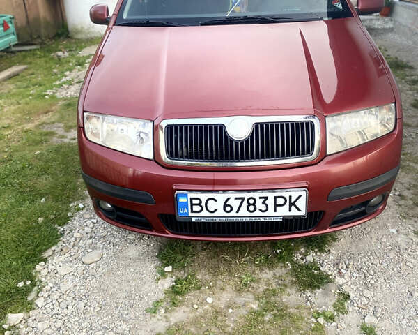 Красный Шкода Фабия, объемом двигателя 1.39 л и пробегом 166 тыс. км за 4000 $, фото 3 на Automoto.ua