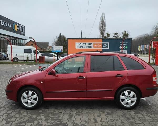 Красный Шкода Фабия, объемом двигателя 1.39 л и пробегом 212 тыс. км за 3800 $, фото 8 на Automoto.ua