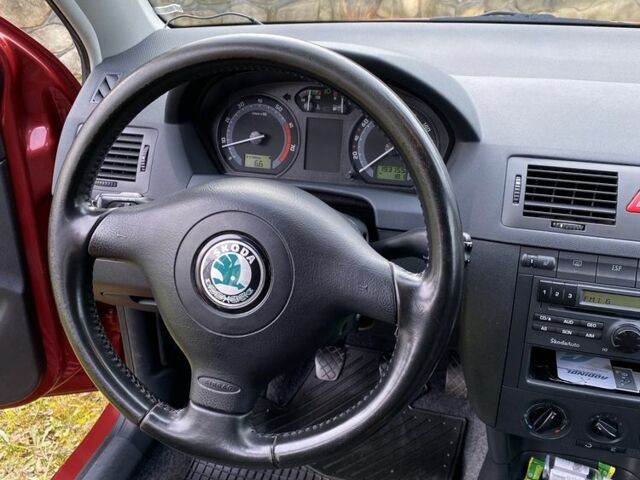 Червоний Шкода Фабія, об'ємом двигуна 1.4 л та пробігом 193 тис. км за 4550 $, фото 6 на Automoto.ua