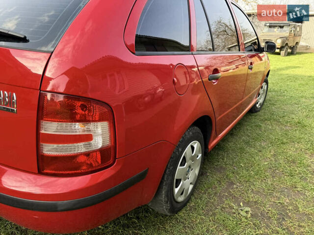 Красный Шкода Фабия, объемом двигателя 1.39 л и пробегом 209 тыс. км за 3990 $, фото 17 на Automoto.ua