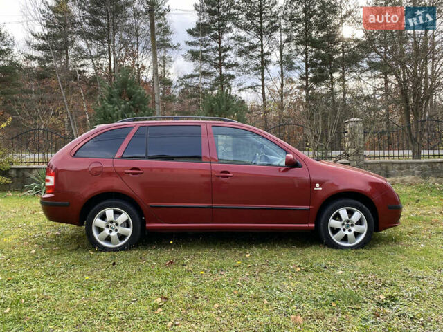 Красный Шкода Фабия, объемом двигателя 1.39 л и пробегом 194 тыс. км за 4490 $, фото 12 на Automoto.ua