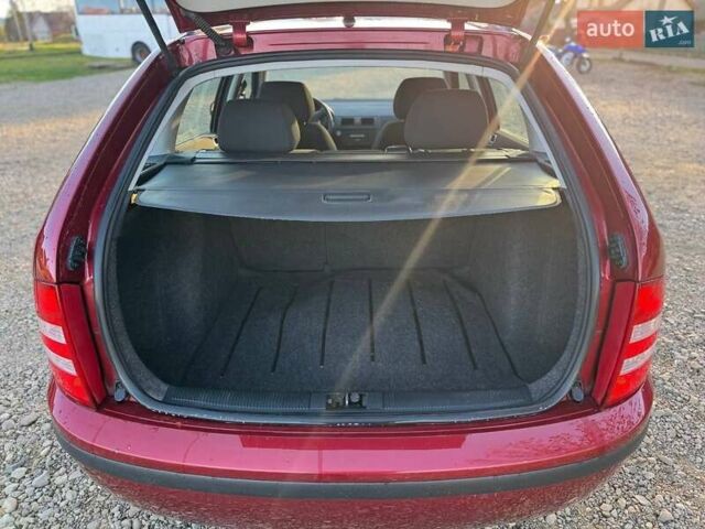Красный Шкода Фабия, объемом двигателя 1.39 л и пробегом 201 тыс. км за 4199 $, фото 27 на Automoto.ua