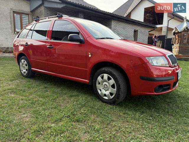 Красный Шкода Фабия, объемом двигателя 1.39 л и пробегом 209 тыс. км за 3990 $, фото 15 на Automoto.ua