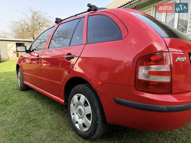 Красный Шкода Фабия, объемом двигателя 1.39 л и пробегом 209 тыс. км за 3990 $, фото 18 на Automoto.ua
