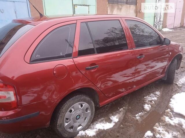 Красный Шкода Фабия, объемом двигателя 1.2 л и пробегом 251 тыс. км за 3500 $, фото 1 на Automoto.ua