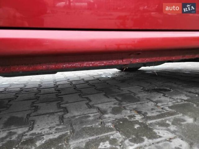 Красный Шкода Фабия, объемом двигателя 1.39 л и пробегом 212 тыс. км за 3800 $, фото 14 на Automoto.ua