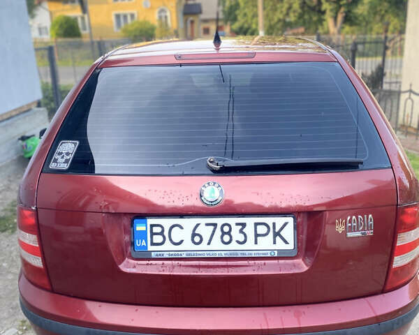 Красный Шкода Фабия, объемом двигателя 1.39 л и пробегом 166 тыс. км за 4000 $, фото 5 на Automoto.ua