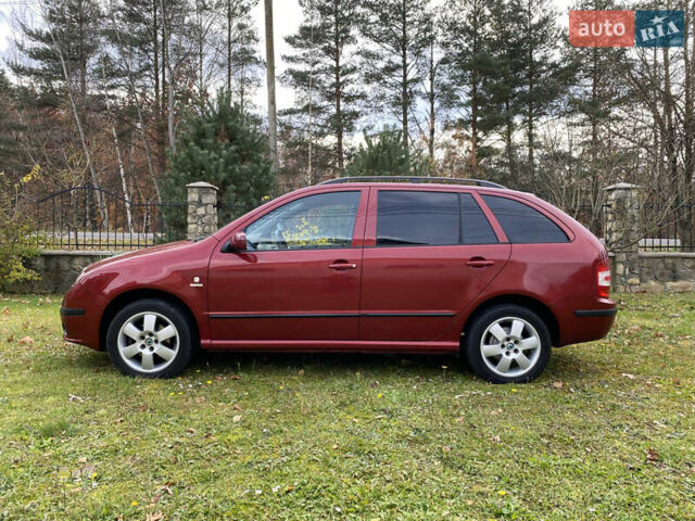 Красный Шкода Фабия, объемом двигателя 1.39 л и пробегом 194 тыс. км за 4490 $, фото 6 на Automoto.ua