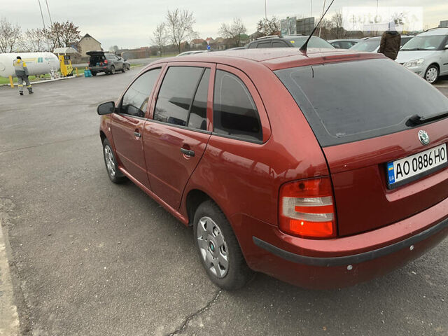 Красный Шкода Фабия, объемом двигателя 1.2 л и пробегом 251 тыс. км за 3500 $, фото 14 на Automoto.ua