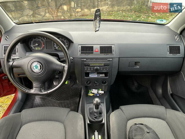 Красный Шкода Фабия, объемом двигателя 1.39 л и пробегом 194 тыс. км за 4490 $, фото 18 на Automoto.ua