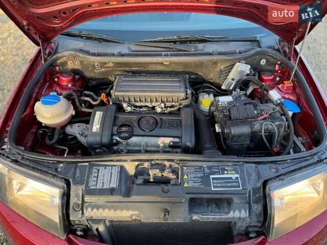 Красный Шкода Фабия, объемом двигателя 1.39 л и пробегом 201 тыс. км за 4199 $, фото 28 на Automoto.ua