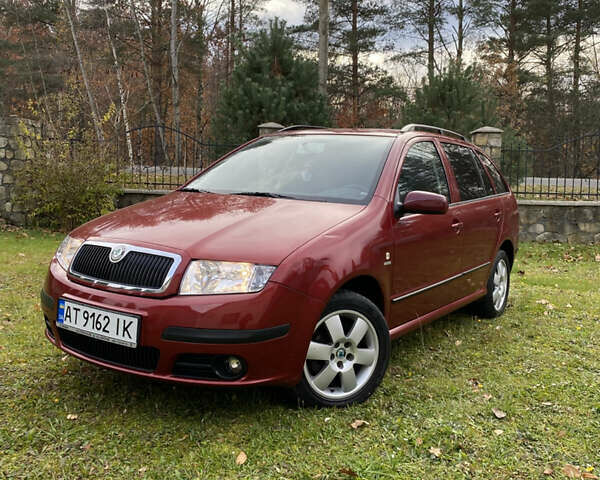 Красный Шкода Фабия, объемом двигателя 1.39 л и пробегом 194 тыс. км за 4490 $, фото 5 на Automoto.ua