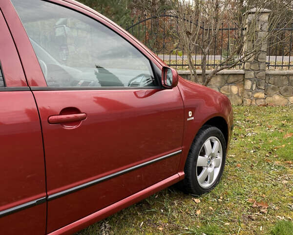 Красный Шкода Фабия, объемом двигателя 1.39 л и пробегом 194 тыс. км за 4490 $, фото 11 на Automoto.ua