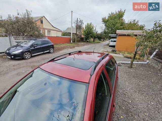 Красный Шкода Фабия, объемом двигателя 1.39 л и пробегом 226 тыс. км за 5300 $, фото 4 на Automoto.ua