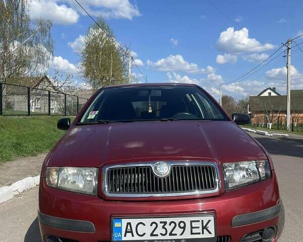 Красный Шкода Фабия, объемом двигателя 1.2 л и пробегом 218 тыс. км за 3300 $, фото 14 на Automoto.ua
