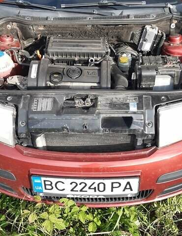 Красный Шкода Фабия, объемом двигателя 1.4 л и пробегом 255 тыс. км за 4100 $, фото 2 на Automoto.ua