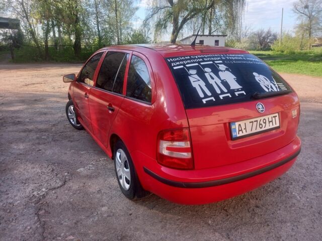 Красный Шкода Фабия, объемом двигателя 1.4 л и пробегом 292 тыс. км за 5000 $, фото 2 на Automoto.ua