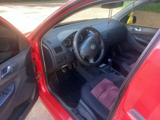 Красный Шкода Фабия, объемом двигателя 1.4 л и пробегом 292 тыс. км за 5000 $, фото 6 на Automoto.ua