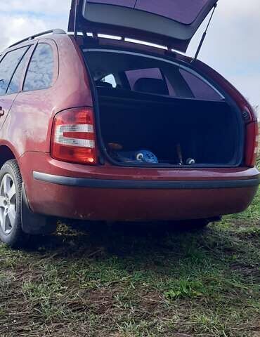 Красный Шкода Фабия, объемом двигателя 1.4 л и пробегом 255 тыс. км за 4100 $, фото 12 на Automoto.ua