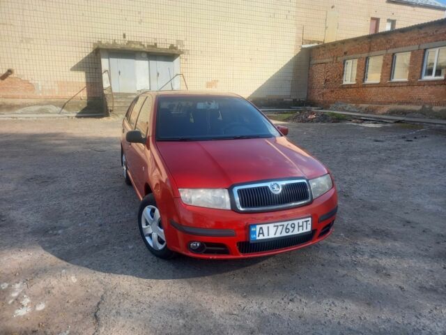 Красный Шкода Фабия, объемом двигателя 1.4 л и пробегом 292 тыс. км за 5000 $, фото 3 на Automoto.ua