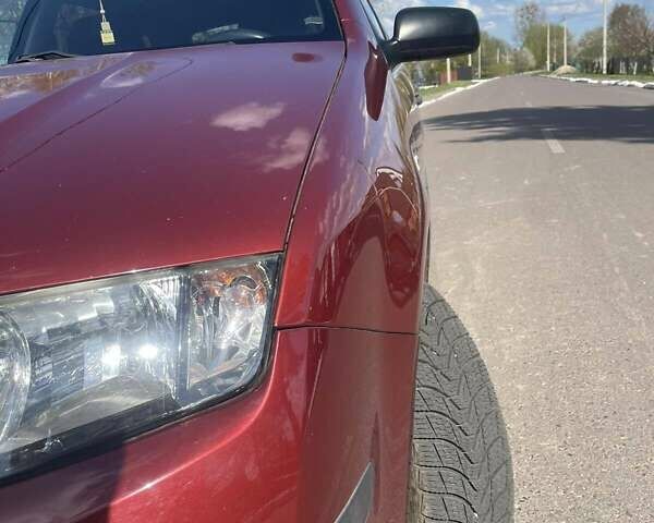 Красный Шкода Фабия, объемом двигателя 1.2 л и пробегом 218 тыс. км за 3300 $, фото 4 на Automoto.ua