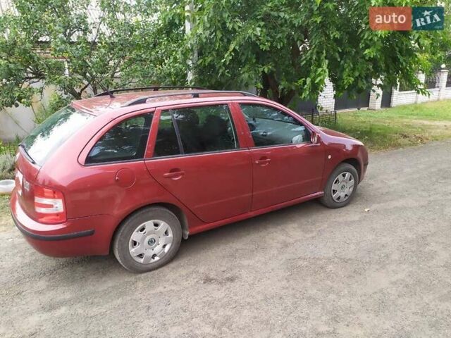 Красный Шкода Фабия, объемом двигателя 1.4 л и пробегом 208 тыс. км за 6300 $, фото 3 на Automoto.ua
