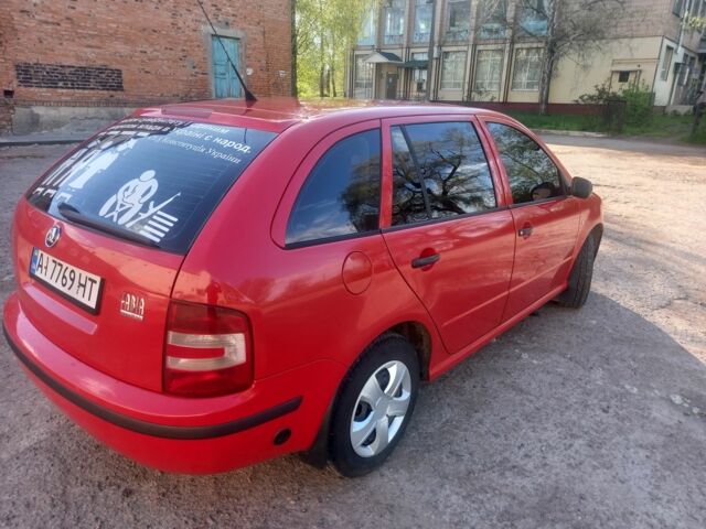 Красный Шкода Фабия, объемом двигателя 1.4 л и пробегом 292 тыс. км за 5000 $, фото 1 на Automoto.ua