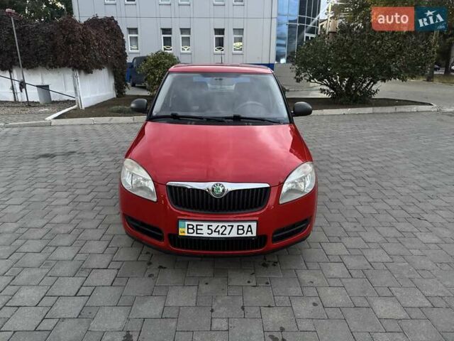 Красный Шкода Фабия, объемом двигателя 1.39 л и пробегом 146 тыс. км за 6200 $, фото 1 на Automoto.ua