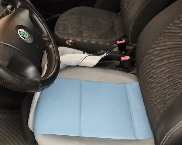 Красный Шкода Фабия, объемом двигателя 1.4 л и пробегом 162 тыс. км за 4850 $, фото 11 на Automoto.ua