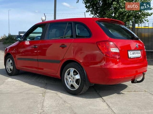 Красный Шкода Фабия, объемом двигателя 1.39 л и пробегом 258 тыс. км за 4690 $, фото 6 на Automoto.ua