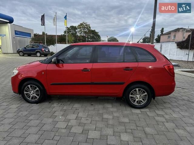 Красный Шкода Фабия, объемом двигателя 1.39 л и пробегом 146 тыс. км за 6200 $, фото 3 на Automoto.ua