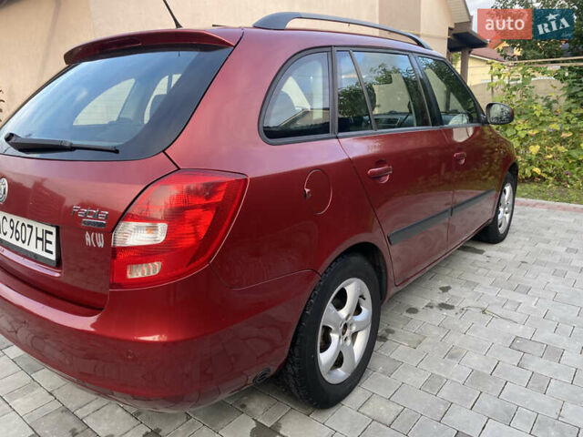Красный Шкода Фабия, объемом двигателя 1.39 л и пробегом 180 тыс. км за 5000 $, фото 7 на Automoto.ua