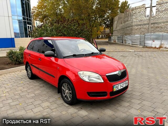 Красный Шкода Фабия, объемом двигателя 1.4 л и пробегом 146 тыс. км за 5499 $, фото 4 на Automoto.ua