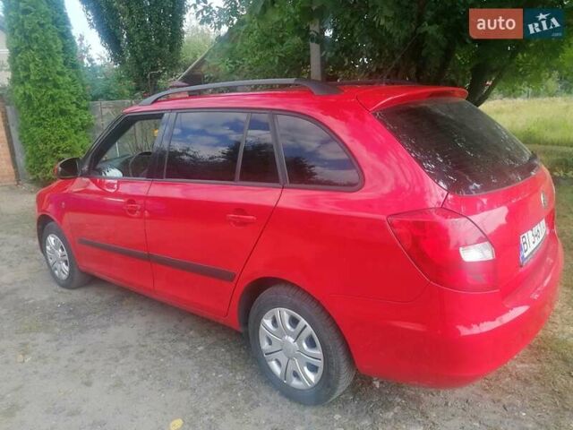 Красный Шкода Фабия, объемом двигателя 1.4 л и пробегом 248 тыс. км за 5350 $, фото 8 на Automoto.ua