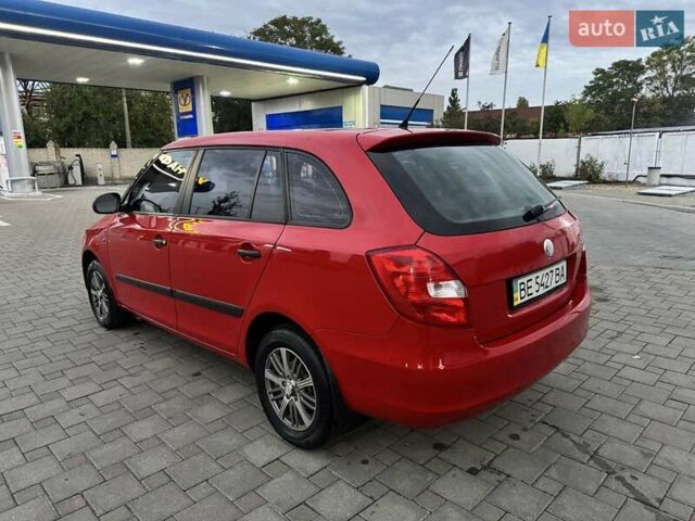 Красный Шкода Фабия, объемом двигателя 1.39 л и пробегом 146 тыс. км за 5500 $, фото 2 на Automoto.ua