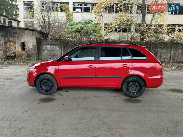 Красный Шкода Фабия, объемом двигателя 1.2 л и пробегом 247 тыс. км за 4199 $, фото 7 на Automoto.ua