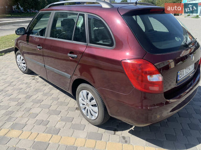 Красный Шкода Фабия, объемом двигателя 1.2 л и пробегом 174 тыс. км за 4850 $, фото 2 на Automoto.ua