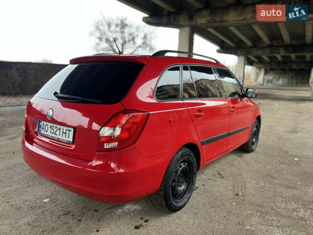 Красный Шкода Фабия, объемом двигателя 1.2 л и пробегом 247 тыс. км за 4199 $, фото 5 на Automoto.ua