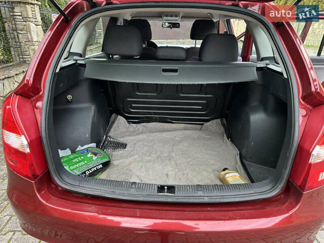 Красный Шкода Фабия, объемом двигателя 1.39 л и пробегом 182 тыс. км за 5500 $, фото 5 на Automoto.ua