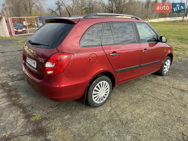 Красный Шкода Фабия, объемом двигателя 1.2 л и пробегом 292 тыс. км за 4600 $, фото 14 на Automoto.ua