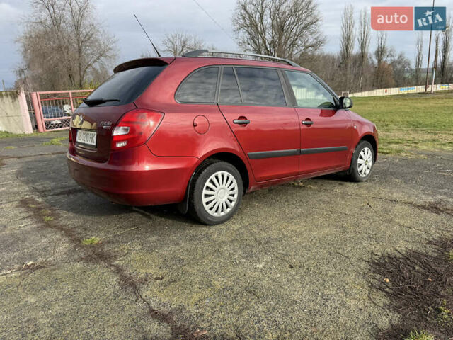 Красный Шкода Фабия, объемом двигателя 1.2 л и пробегом 292 тыс. км за 4600 $, фото 21 на Automoto.ua