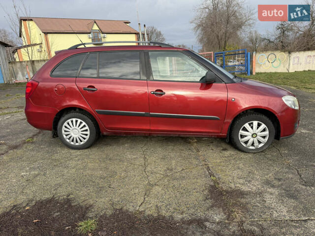 Красный Шкода Фабия, объемом двигателя 1.2 л и пробегом 292 тыс. км за 4600 $, фото 11 на Automoto.ua