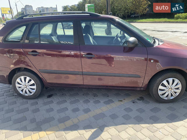 Красный Шкода Фабия, объемом двигателя 1.2 л и пробегом 174 тыс. км за 4850 $, фото 5 на Automoto.ua