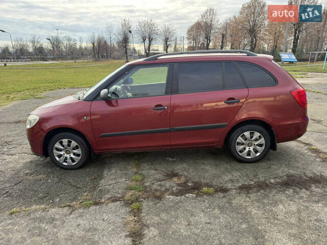 Красный Шкода Фабия, объемом двигателя 1.2 л и пробегом 292 тыс. км за 4600 $, фото 6 на Automoto.ua