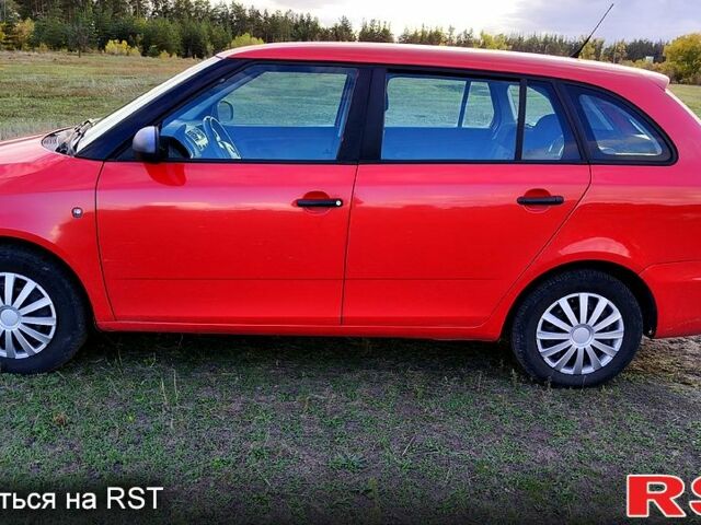 Шкода Фабия 2010 в Каменское - Днепродзержинск на Automoto.ua Красный Шкода Фабия, объемом двигателя 1.4 л и пробегом 235 тыс. км за 4100 $, фото 1 на Automoto.ua